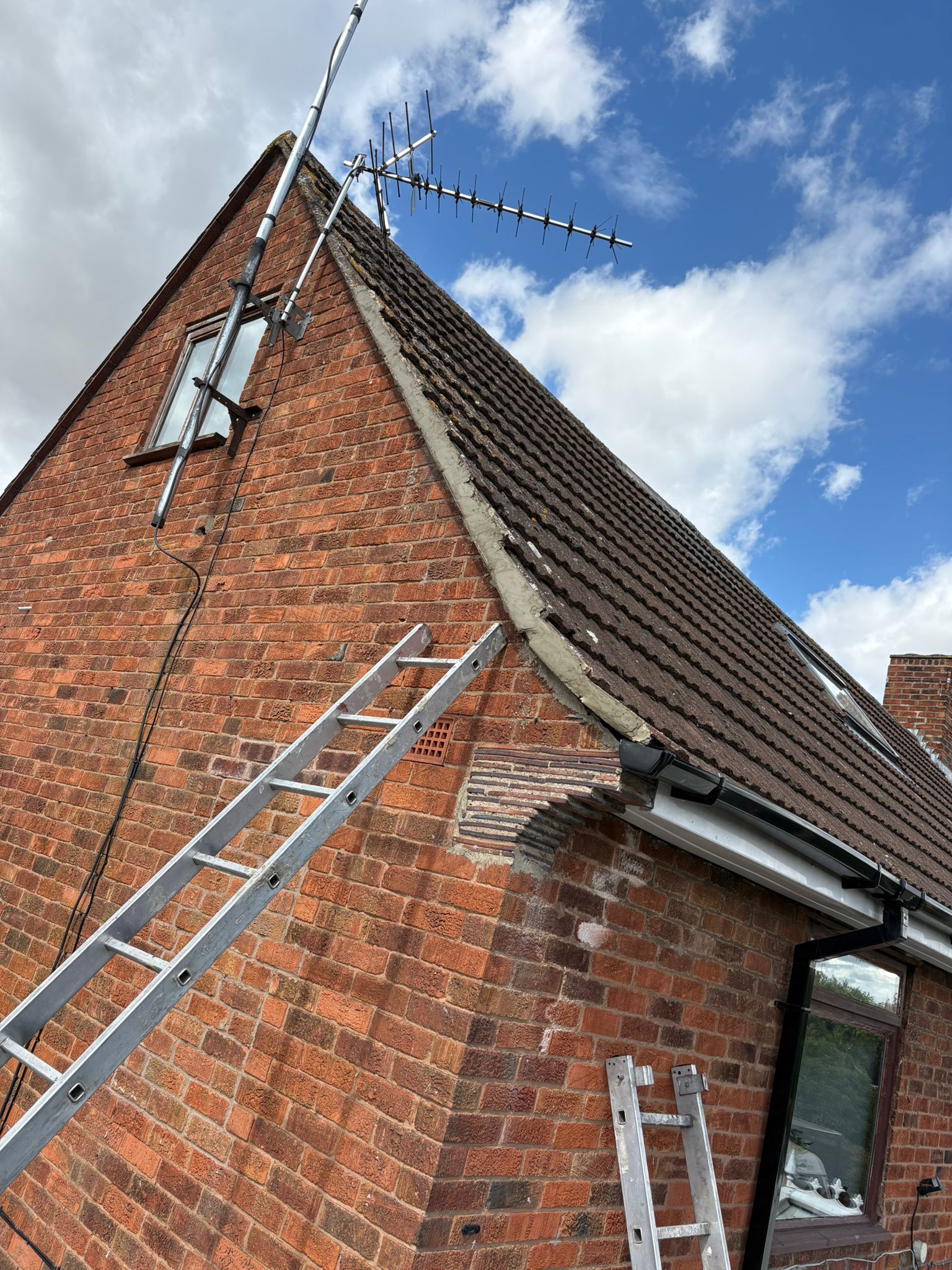 Brick gable end with ladder for verge repair work