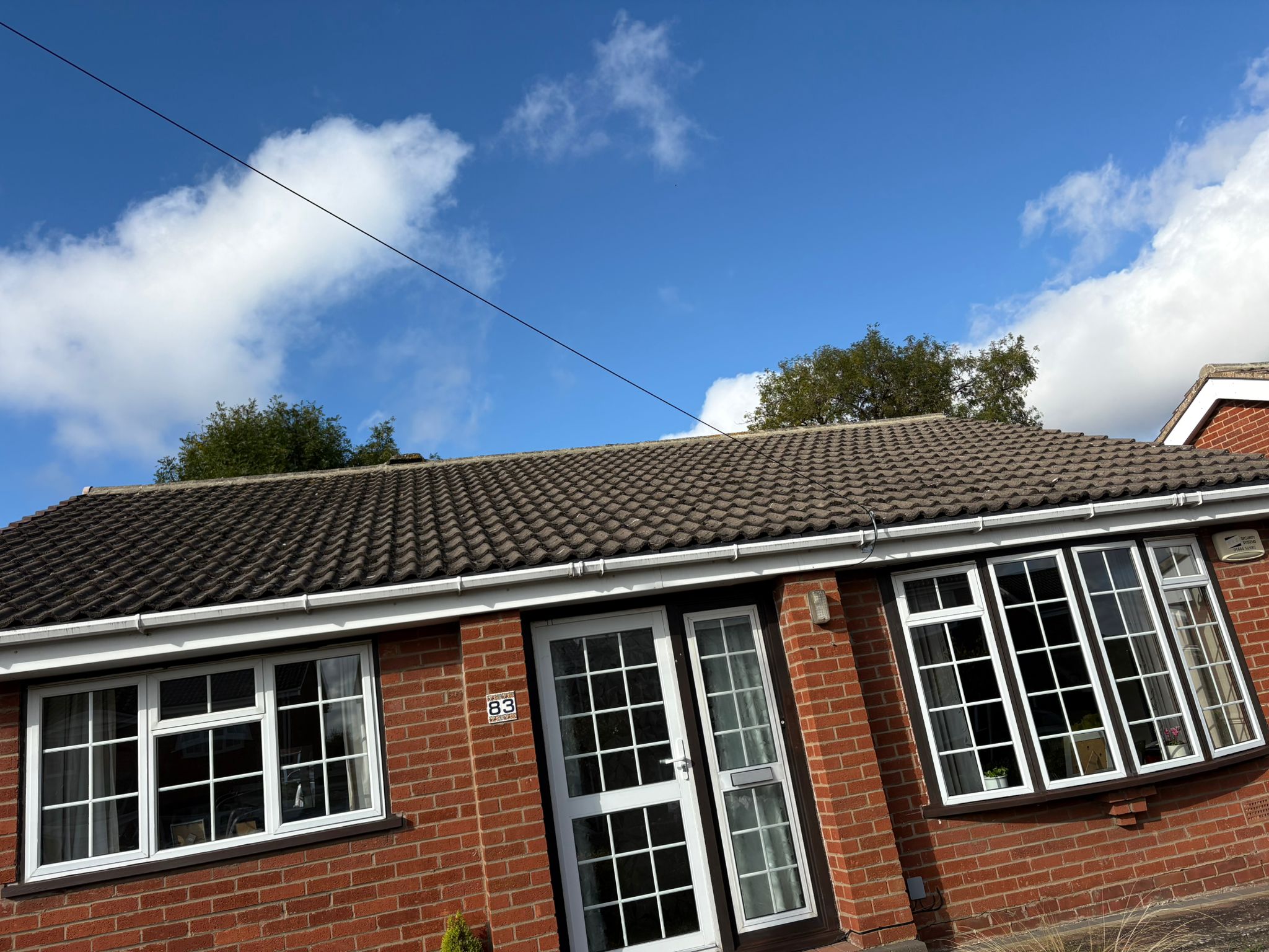 Emergency roof repair on storm-damaged property